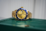 Rolex Submariner 16808 – 18K Yellow Gold – Diamond & Sapphire Serti Dial – Blue Bezel - Image 4